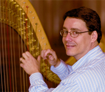 Peter Wiley regulating a harp